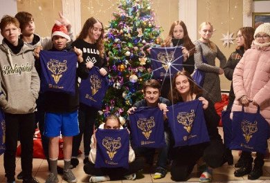Handing over Santa Claus parcels for children from orphanages